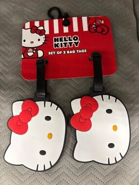 Two Hello Kitty Head Luggage Bag Tags backpack